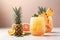 Grapefruit and pineapple mocktail on light background