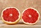 Grapefruit segments on wooden background