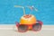 Grapefruit and sunglasses - poolside