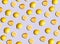 Graphic Background Pattern Of Lemons Against Purple Background