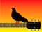Graphic of bird on guitar neck