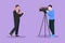 Graphic flat design drawing correspondent, reporter and operator. News reporter performing. Journalists on air. Video cameraman