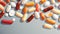 Graphic Illustration of Prescription Pills Scattered on Gray Background, Simple