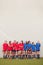 Graphic Shot Of Womens Football Team Leaning Against Wall Whilst Training For Soccer Match