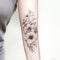Graphite Petunia Tattoos: Organic Blooms On The Upper Arm
