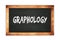 GRAPHOLOGY text written on wooden frame school blackboard