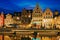 Graslei street and canal in the evening. Ghent, Belgium