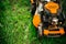 Grass maintenance details - close up view of grass mower, lawnmower details