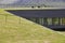 Grass roof geometric building in Eysturoy. Nordragota village, Faroe