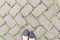 Grass Stone Floor texture pavement design and woman\'s feet.