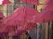 Grasse France pink umbrellas street