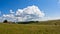 Grassland hills landscape at sunny summer day