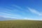 Grassland with white clouds