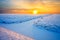 Grassland in winter at sunset