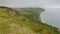 Grasslands meeting the seascape at a beach cove