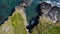Grassy cliffs on the Atlantic Ocean coast. Landscape of Ireland from a height. Seaside rocks. View from above