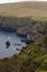 Grassy cliffs with rocks at Hermaness national nature reserve, Shetland