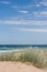 Grassy dune at the beach on a sunny summers day