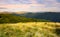 Grassy meadows of Svydovets ridge at sunset