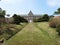 Grassy path to mansion