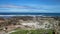 Grassy Rocky Beach Overlooking Deep Blue Ocean