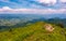 Grassy slope with huge boulders