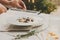 Grate parmesan on wild mushrooms porcini risotto, italian cuisine closeup