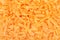 Grated carrots texture background