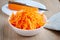 Grated carrots and whole carrot