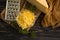 Grated cheese, parsley  culinary a wooden background delicious