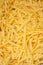 Grated hard cheese for homemade pizza. Russian, Dutch cheese. Grated cheese in  macro