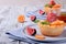 Grated mini pie with cottage cheese topped with pieces of figs and kumquats