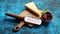 Grated parmesan cheese and metal classic grater placed on wooden cutting board