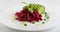 Grated Pickled Beet Root or Beetroot Salad on White Plate