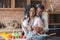 Grateful african man hugging his wife while cooking at kitchen