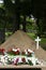 Grave with flowers and cross