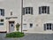 The grave of Franz Gruber, the composer of the song Silent Night, and the facade of his museum house with panels, Hallein, Austria