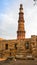 Grave markers with Qutub minar in back