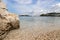 Gravel beach with rocks on the croatian Coast, clear water