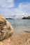 Gravel beach with rocks on the croatian Coast, clear water