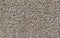 Gravel on concrete wall background