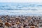 Gravel Depth Of Field and blue sea background.