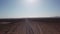 Gravel road in aerial desert. Sandy landscape, nobody. Nature in Namibia, Africa