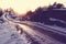 Gravel road between rocks covered with ice