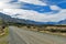 Gravel road to campsite at Glentanner Park Centre with Aoraki / Mount Cook seen in background