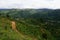 A gravel rural road through mountain plantation in Costa Rica