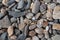 Gravel and stones in all kind of sizes at the beach shore of the Maasvlakte in Rotterdam, Netherlands