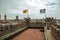 Gravensteen Castle roof and balustrade overlooking Ghent buildings.