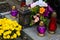 Graves decorations: flowers and votive candles.