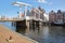 Gravestenenbrug bridge over Spaarne river and with traditional houses in the background, Haarlem